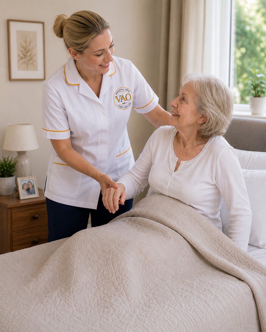 A VAO Care Services registered nurse in white uniform reassuring a client at her bedside.